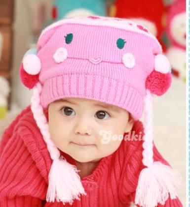  หมวกไหมพรม สีชมพูทักเปียน้อย ๆน่ารักค่ะ